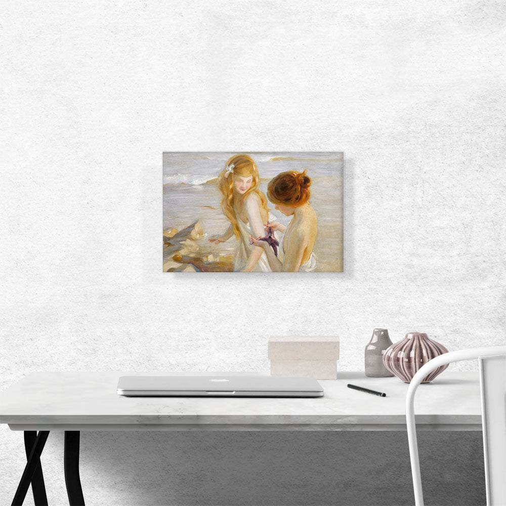Two Young Girls Looking at Starfish